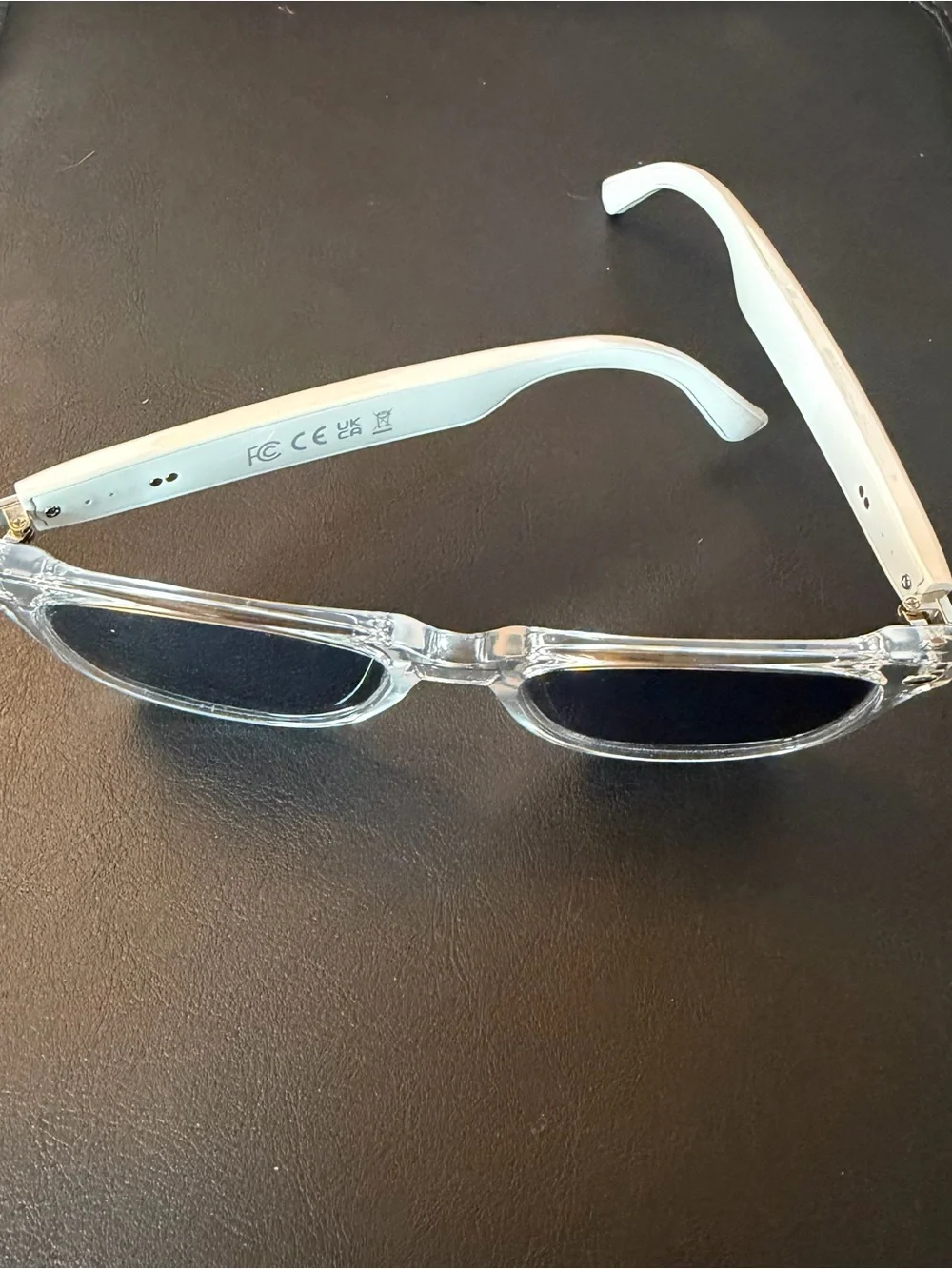 Clear Frame UV-A&B Smart Sunglasses, earbuds & microphone for 8 hours talk